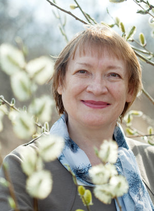 mature-woman-spring-pussywillow-plant.jpg