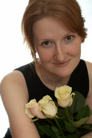 portrait-young-woman-with-bunch-white-roses.jpg